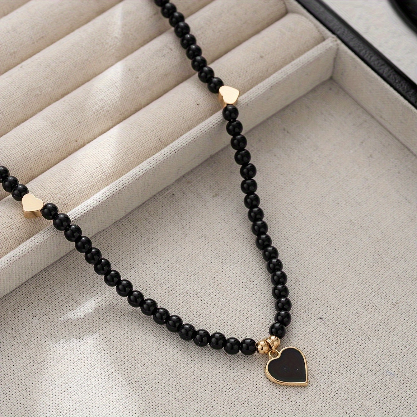 Heart Pendant Black Beaded Necklace with Gold-Tone Accents