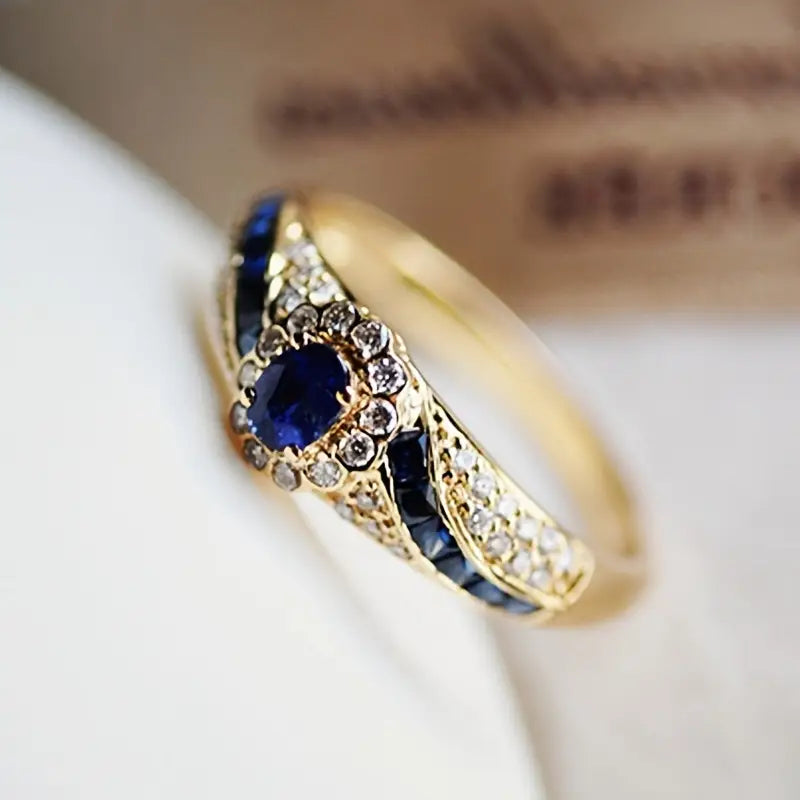 Oval Sapphire Halo Ring with Gold-Tone Filigree Band — view 4