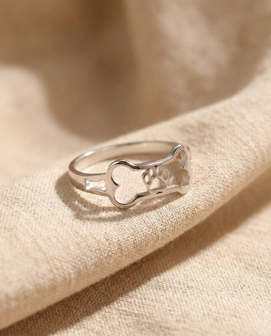 Estelle & Ruby Dog Paw & Bone Motif Ring, Stainless Steel, Adjustable, Sizes 6-10 (AI-generated studio image)