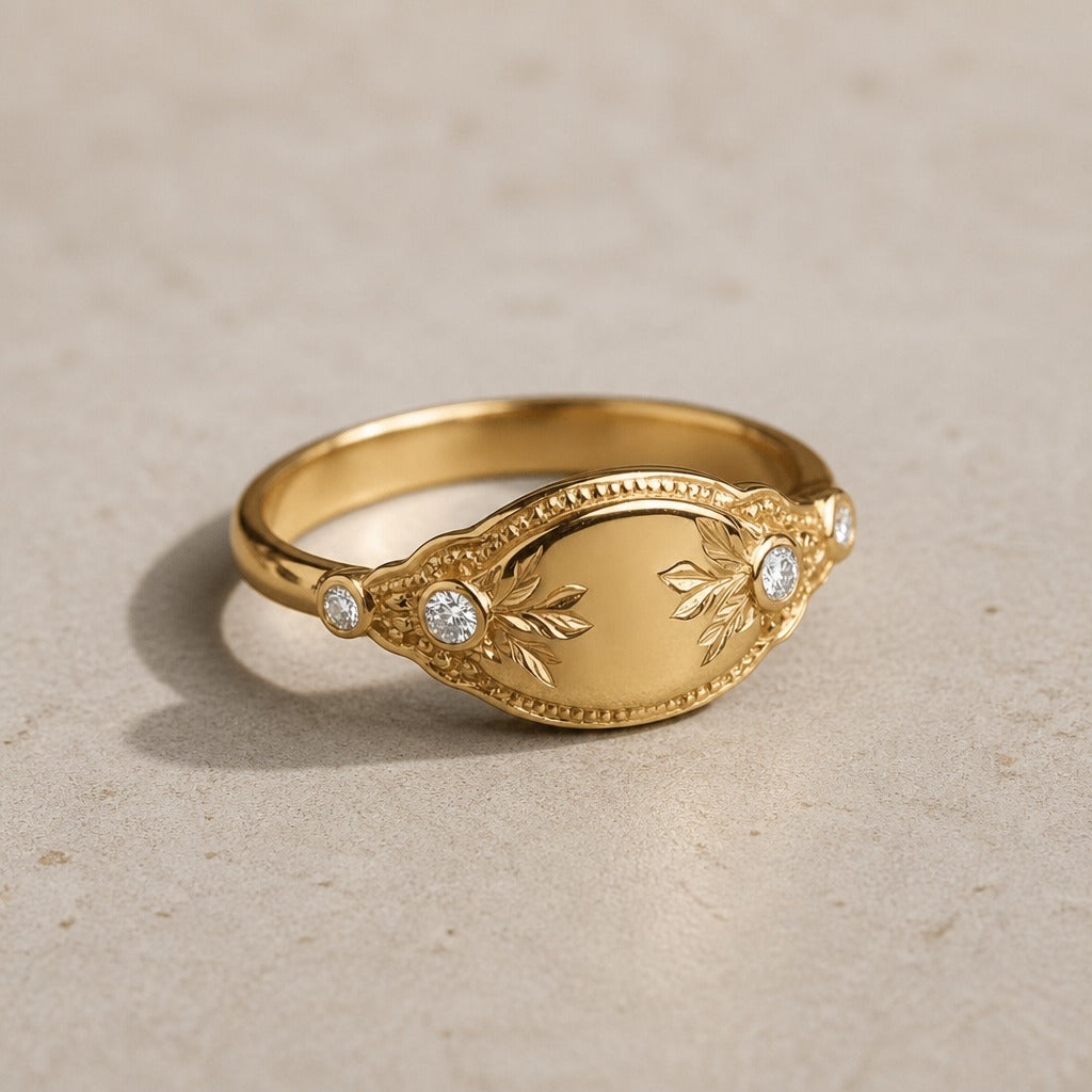 Laurel Leaf Signet Ring with Bezel-Set Cubic Zirconia Stones in Gold-Tone Copper — main image
