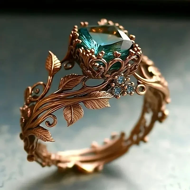 Teal Crystal Statement Ring with Botanical Leaf and Vine Detail in Rose Gold Tone — main image