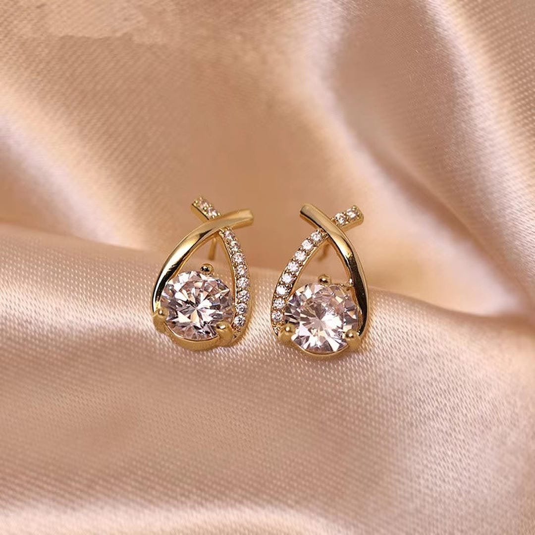 Twisted Teardrop Cubic Zirconia Stud Earrings in Gold Tone