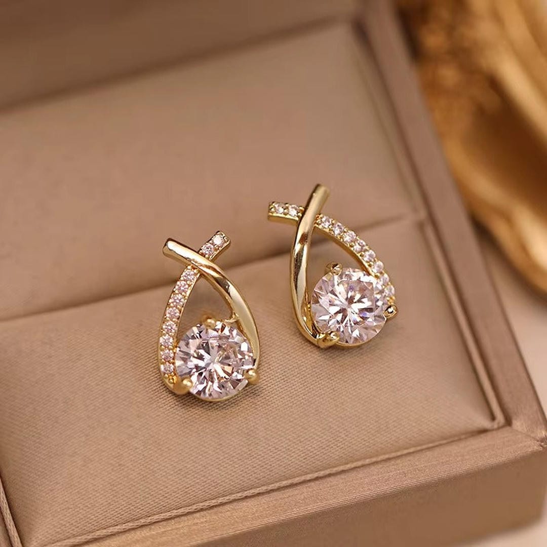 Twisted Teardrop Cubic Zirconia Stud Earrings in Gold Tone