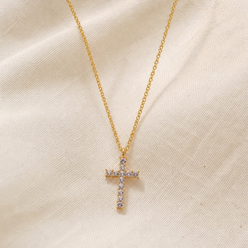 Cross Pendant Necklace with Sparkling Stone Detail in Gold Tone — main image