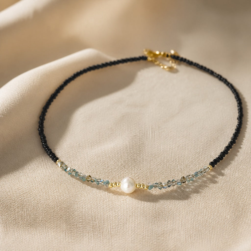 Black Beaded Necklace with Pearl Pendant and Gold-Tone Clasp — view 2