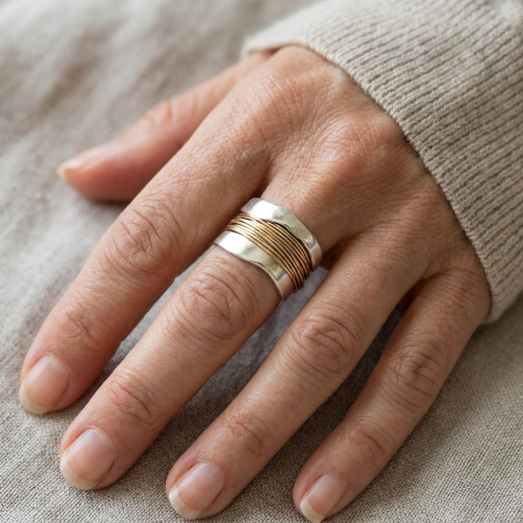 silver ring with golden threads — lifestyle