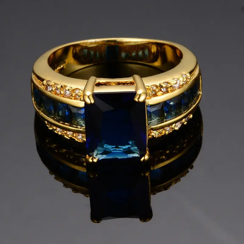 Cushion-Cut Blue Stone Cocktail Ring with Gold-Tone Band and Side Accent Stones — view 3