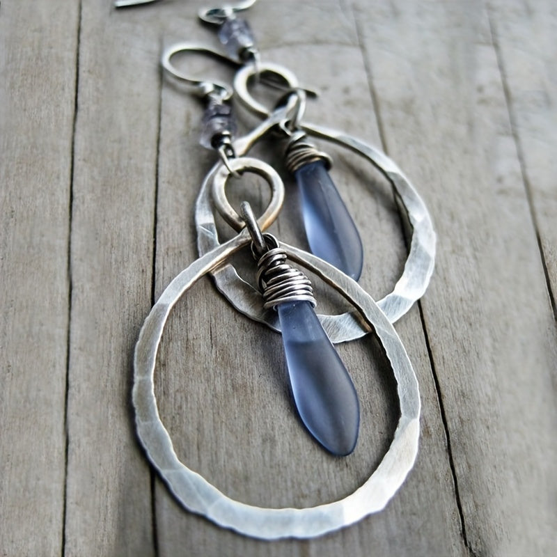 Faceted Blue Glass Drop Earrings with Hammered Teardrop Frame