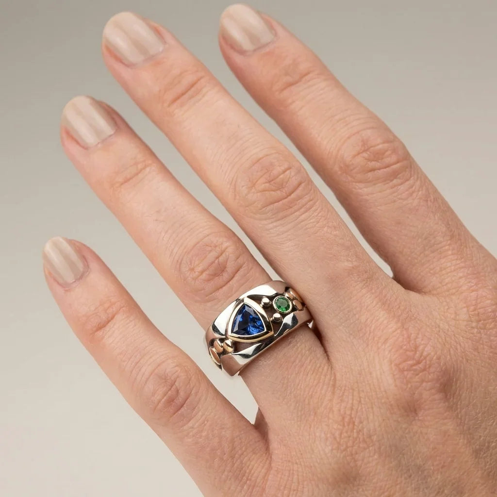 Trilliant Sapphire Cocktail Ring with Topaz Accent and Two-Tone Band