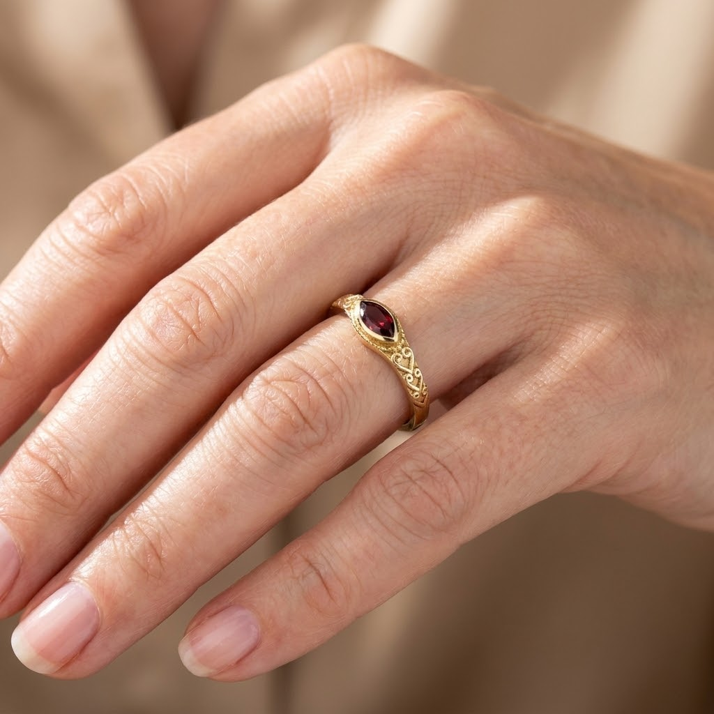 Oval Burgundy Stone Ring with Gold Filigree Band