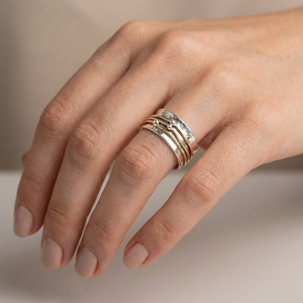 Two-Tone Spinner Ring with Rotating Gold-Tone Bands and Ball Accents
