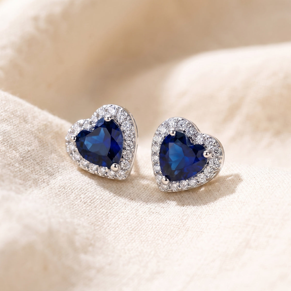 Heart-Shaped Sapphire Stud Earrings with Accent Stone Halo — main image