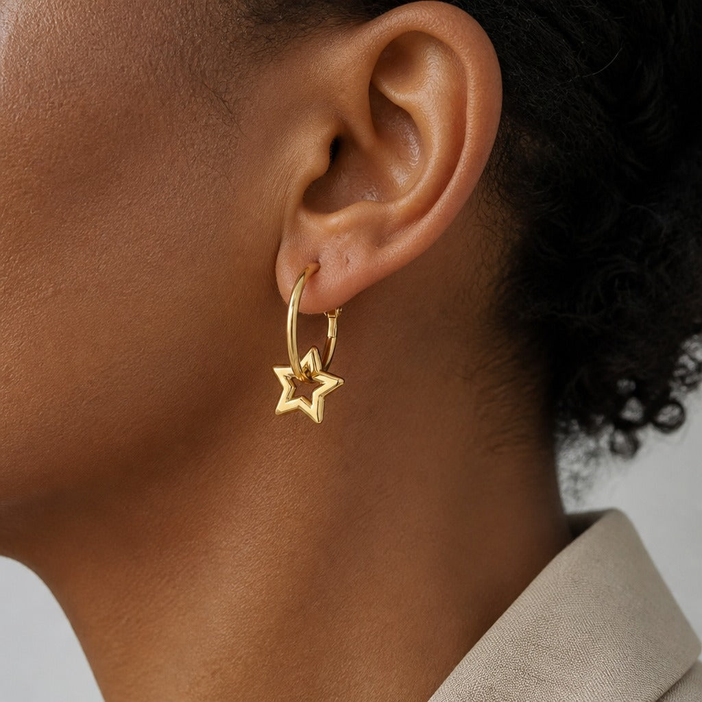 Star Charm Gold Hoop Earrings with Stainless Steel Hinged Closure — main image