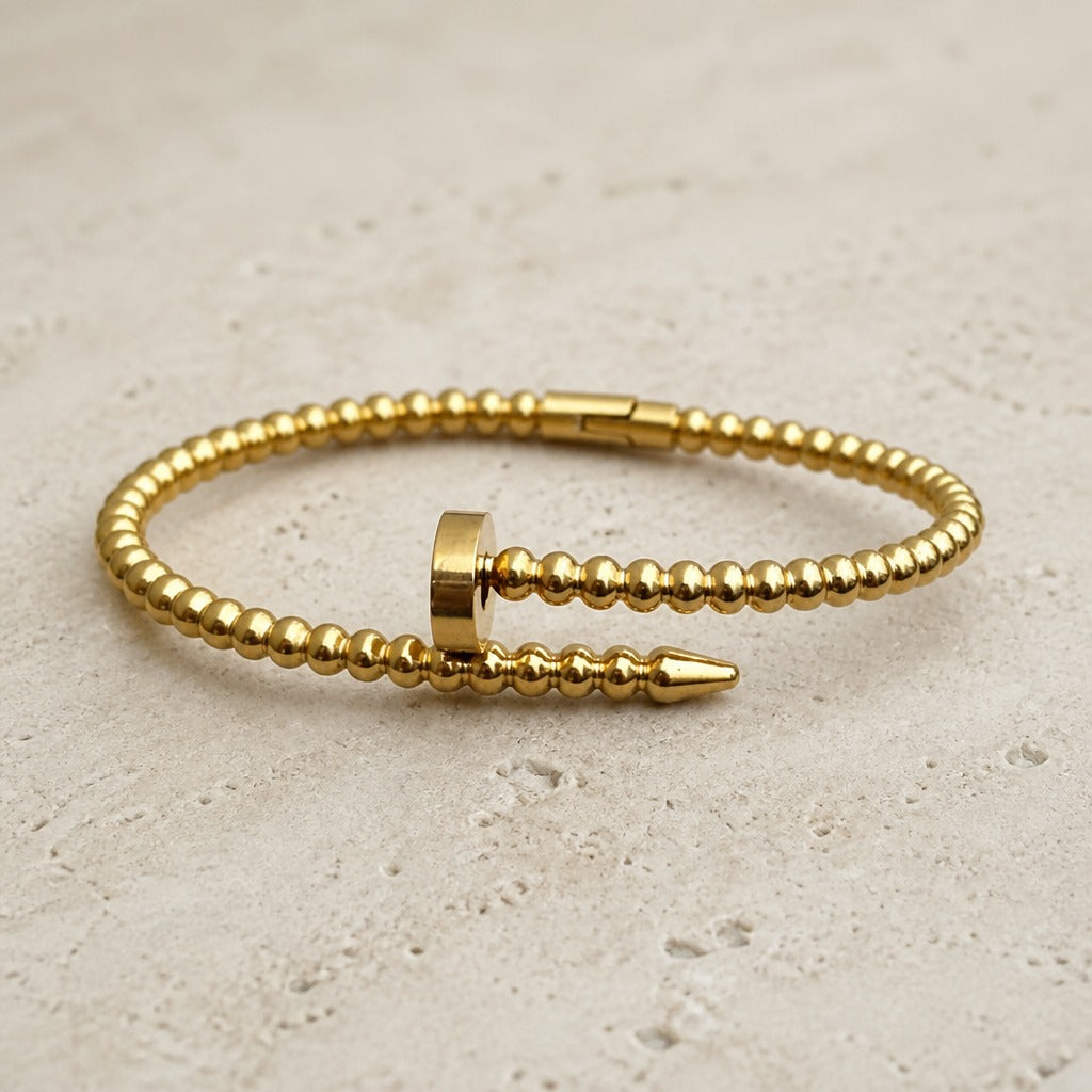 Beaded Cuff Bracelet with Spike Terminal in Gold Tone — main image