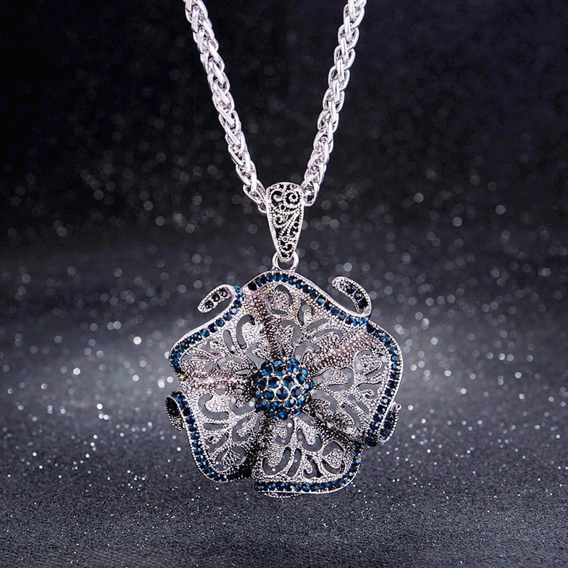 Filigree Mandala Pendant Necklace with Blue Rhinestone Accent and Elephant Motif Detail