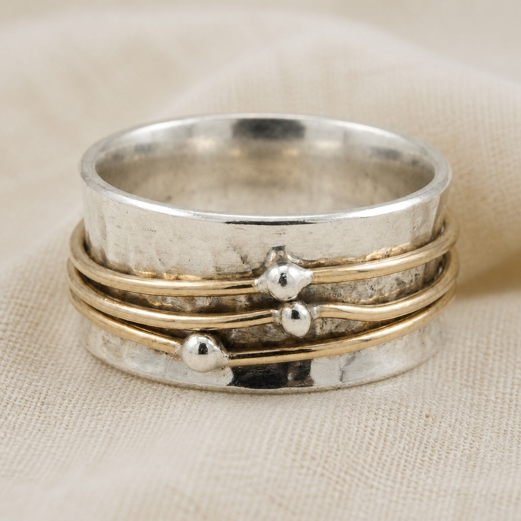 Two-Tone Spinner Ring with Rotating Gold-Tone Bands and Ball Accents