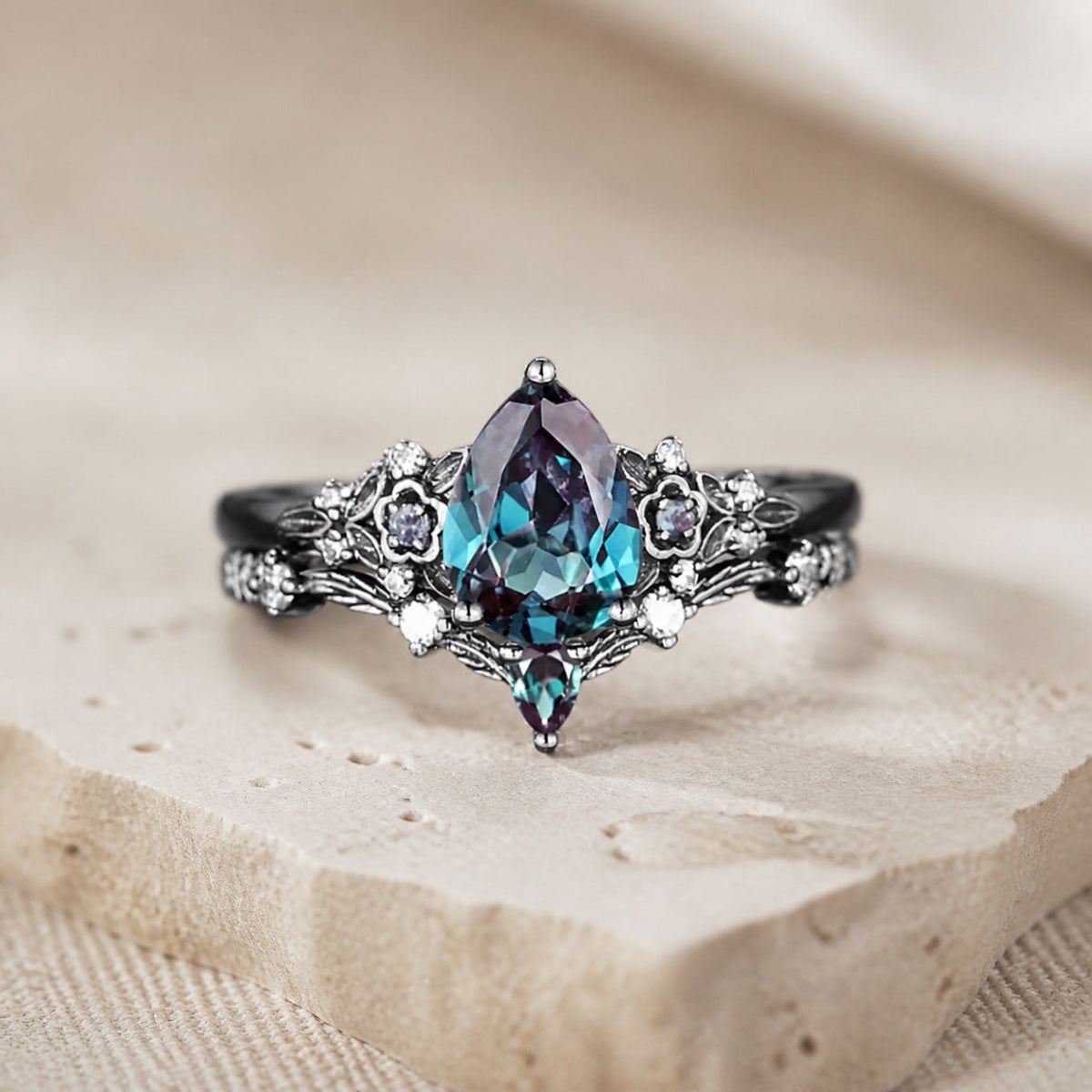 Pear-Cut Sapphire Blue Zirconia Ring Set with Gun-Black Floral Detail — view 2