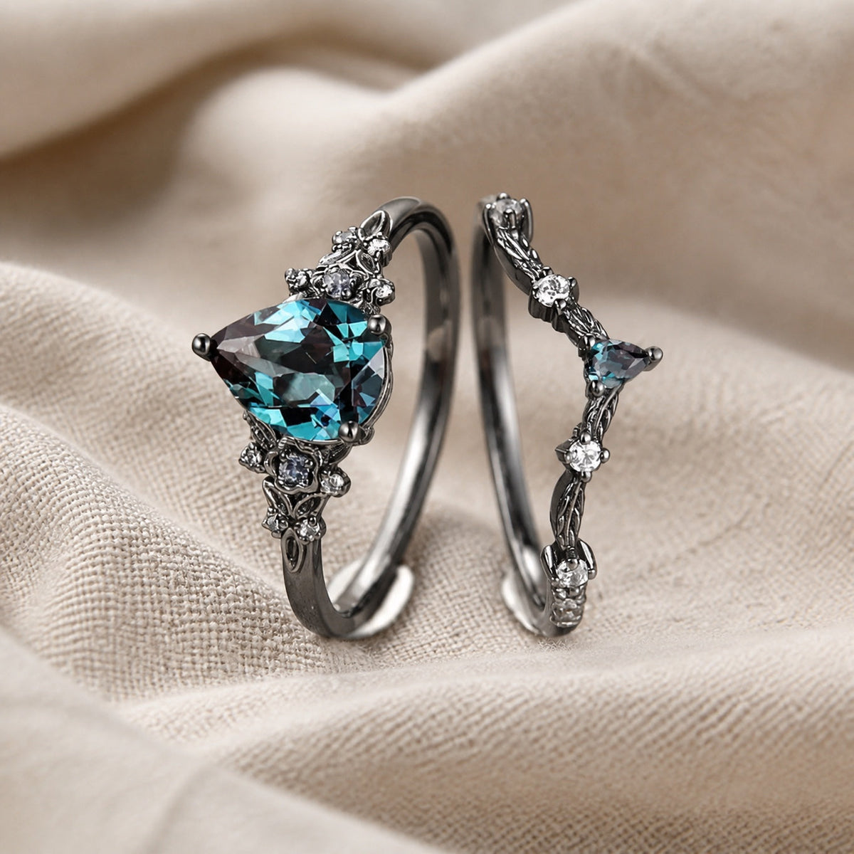 Pear-Cut Sapphire Blue Zirconia Ring Set with Gun-Black Floral Detail — main image