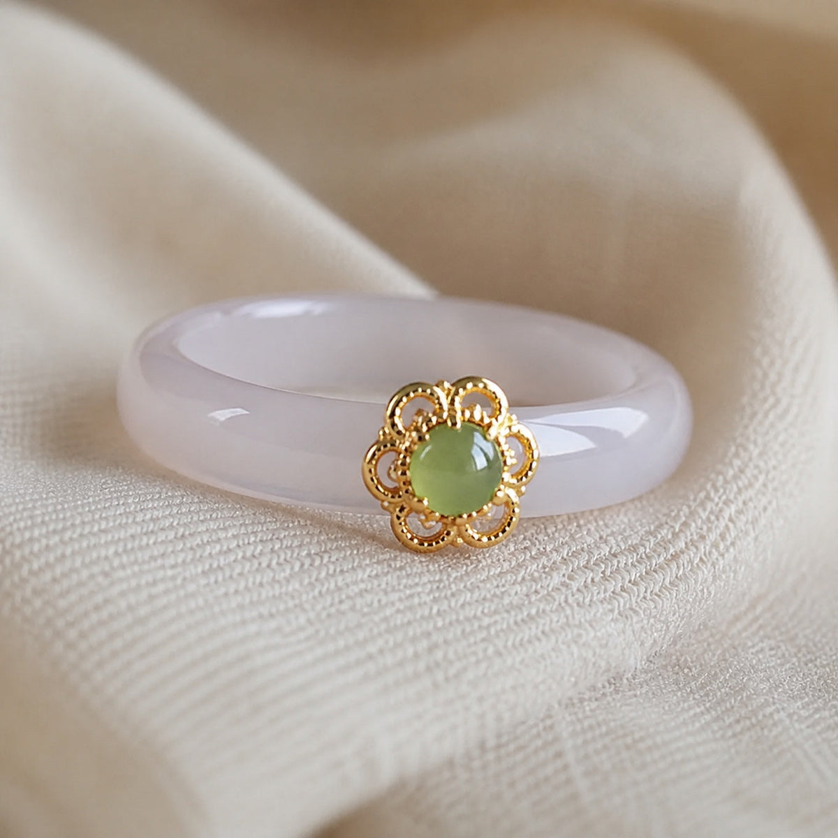 Round Jade Ring with Gold-Tone Filigree Flower Detail — main image