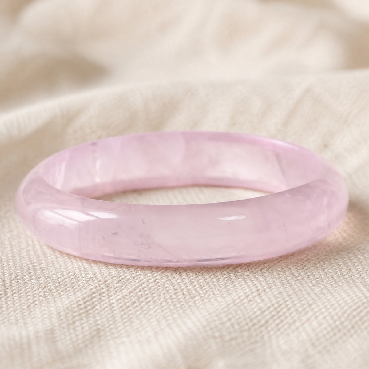 Polished Pink Jade Bangle Bracelet, Round Translucent Stone — main image