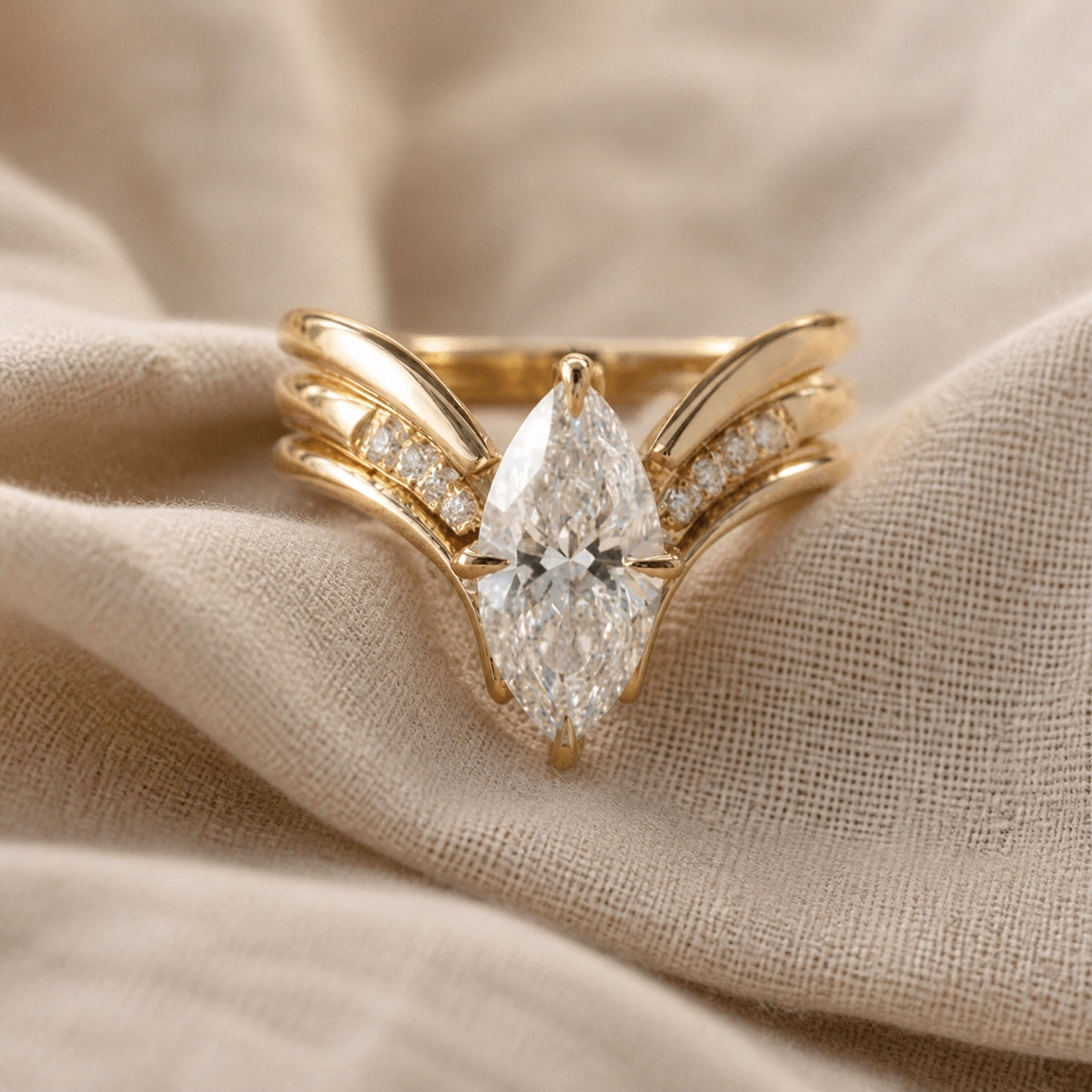 Marquise Clear Stone Cocktail Ring with Gold-Tone Wing Band