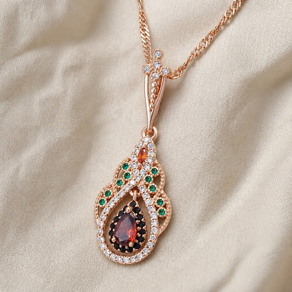 Teardrop Zirconia Necklace with Red, Green and Black Halo Stones in Rose Gold Tone — main image