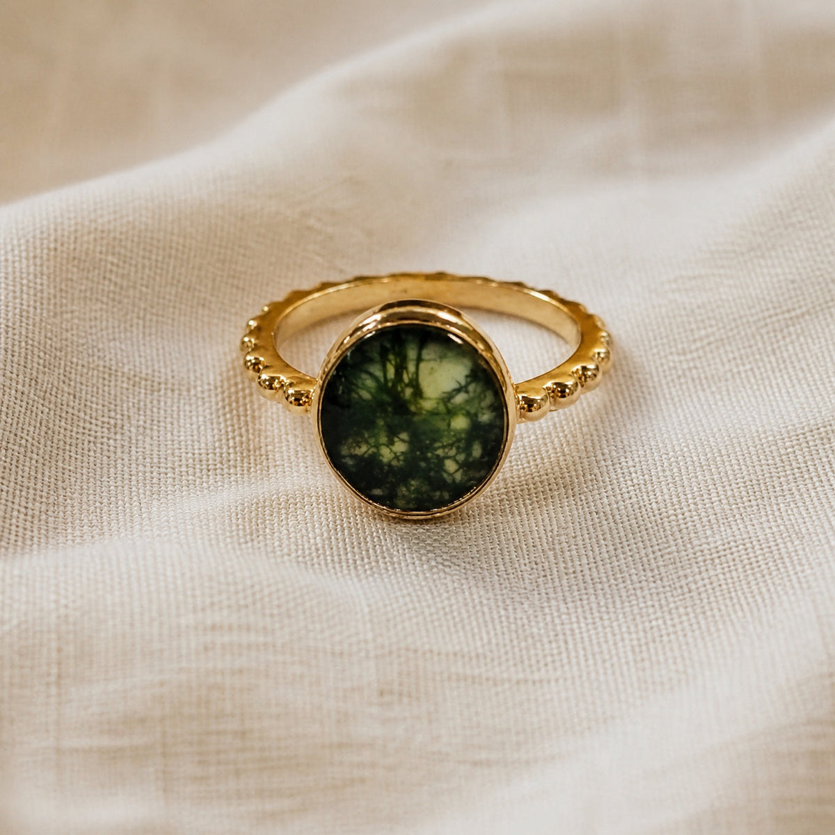 Moss Agate Solitaire Ring with Bezel Setting and Textured Band — main image