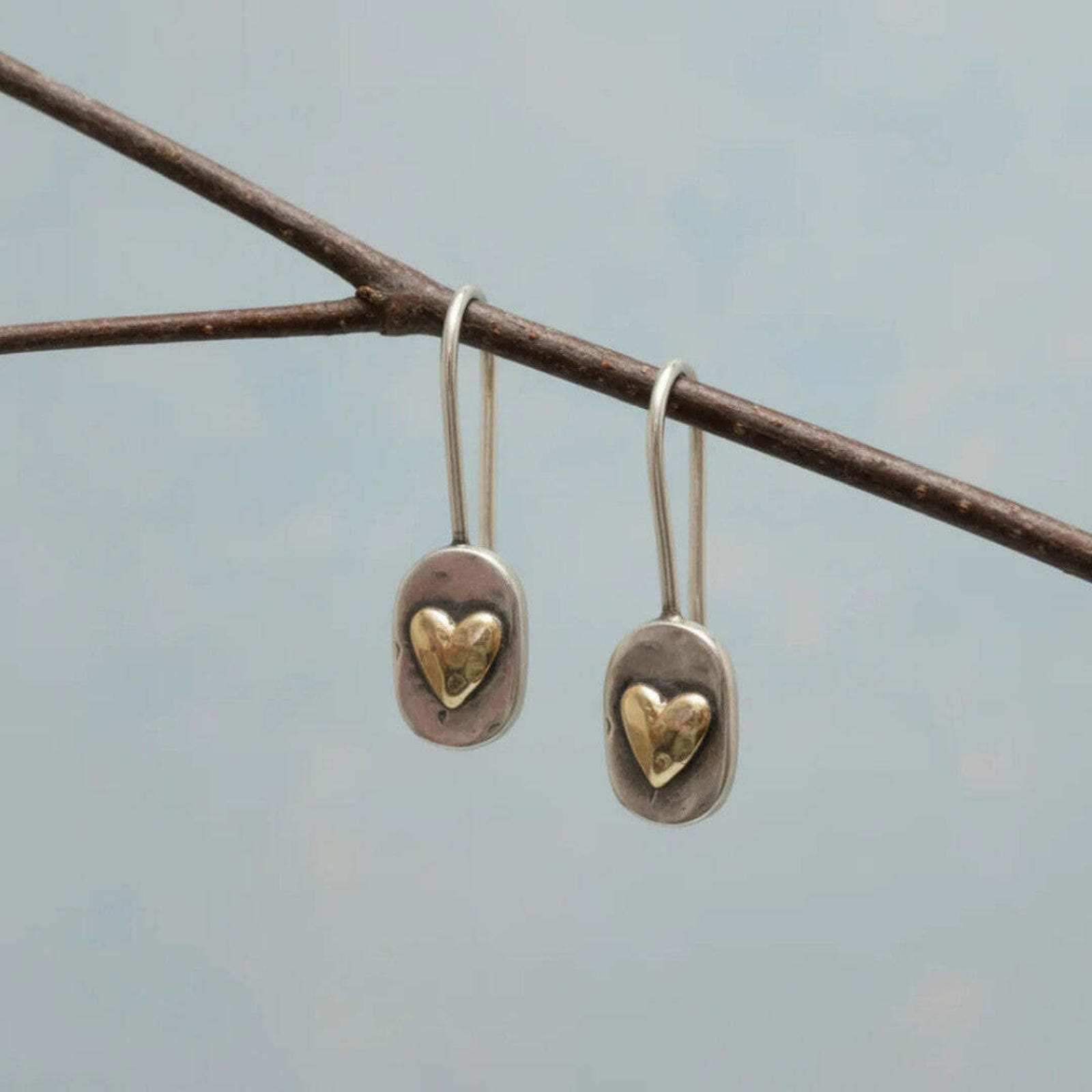 Vintage-Inspired Heart Drop Earrings with Silver and Gold-Tone Contrast