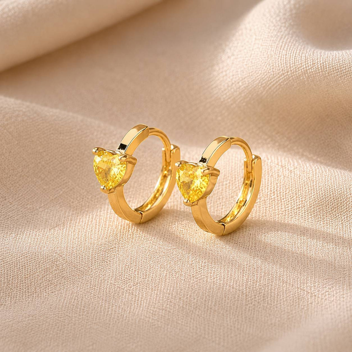 Heart-Shaped Yellow Cubic Zirconia Huggie Hoop Earrings, Nickel-Free Gold-Tone — main image
