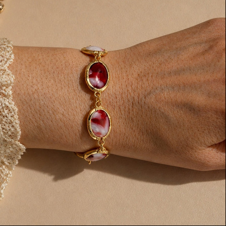 Oval Ruby-Red Gemstone Bracelet with Three Bezel-Set Stones — main image