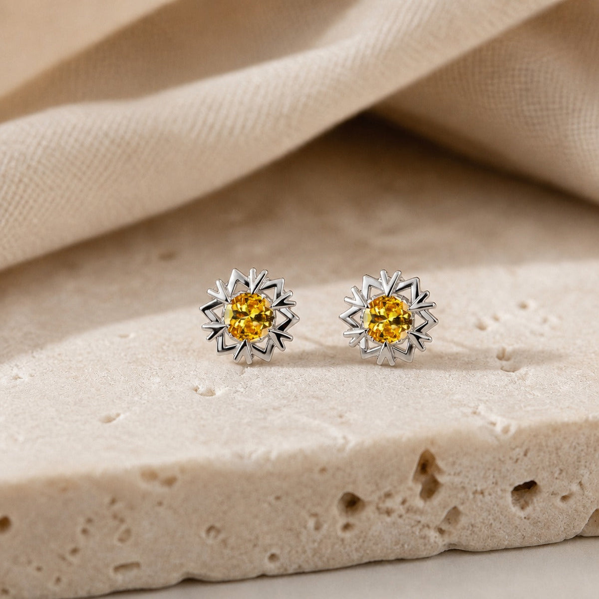 Snowflake Stud Earrings with Golden Cubic Zirconia Stones — main image