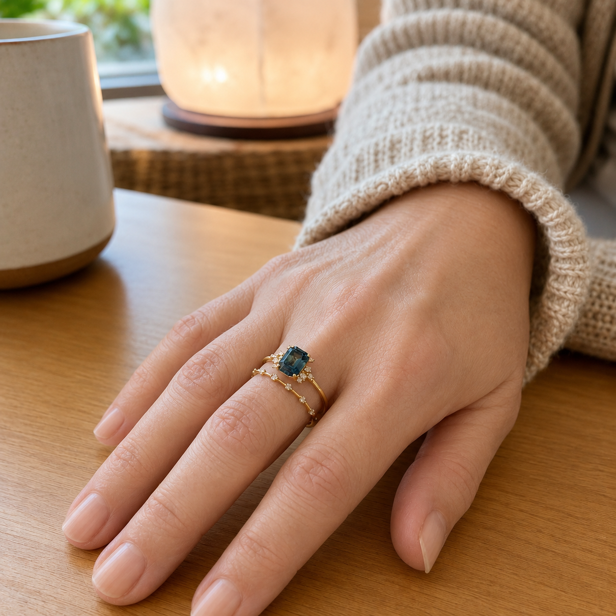 Two-Piece Gold-Tone Ring Set with Emerald-Cut Blue Gemstone and Halo Accents