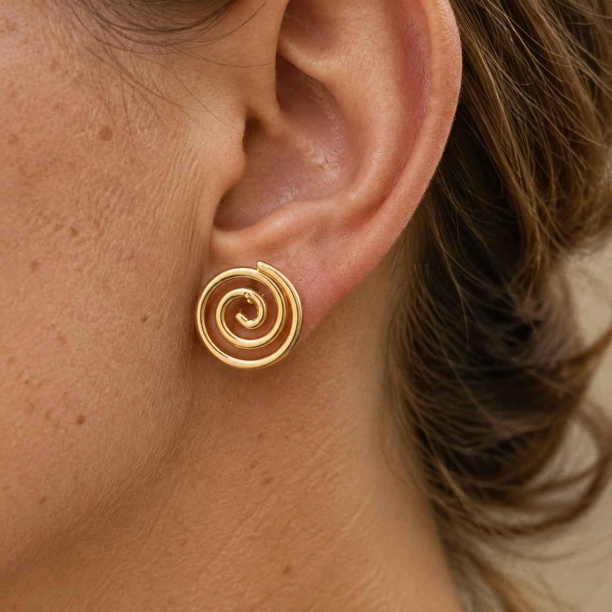 Spiral Stud Earrings with Open Cutout Gold-Tone Design — main image