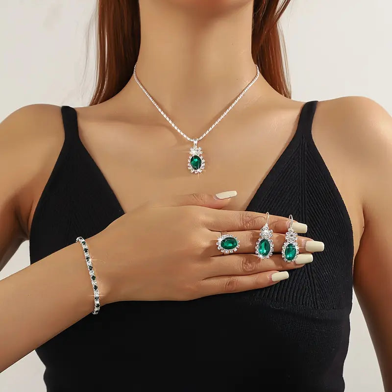 Oval Emerald Halo Jewelry Set with Necklace, Earrings, Bracelet & Ring