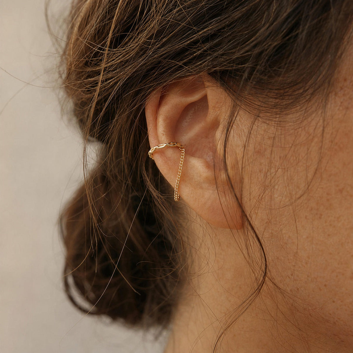 Twisted Gold-Tone Ear Cuff with Chain Tassel — main image