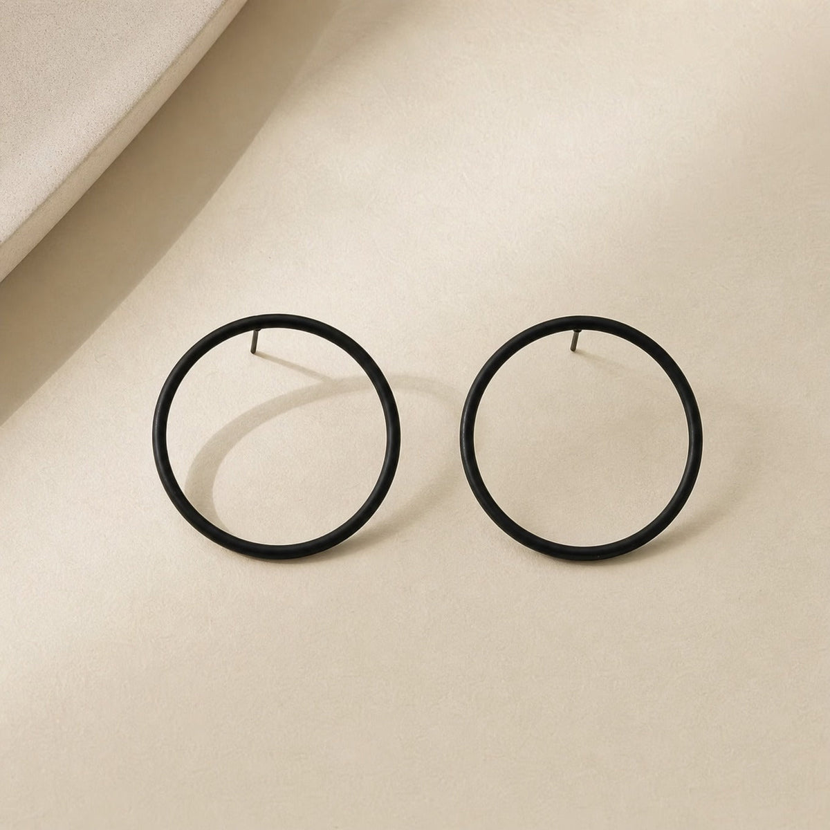 Black Hollow Circle Hoop Earrings with Gold-Plated Post — view 2