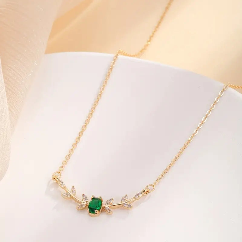 Oval Emerald Pendant Necklace with Floral Accent Stones, Gold-Tone Cable Chain
