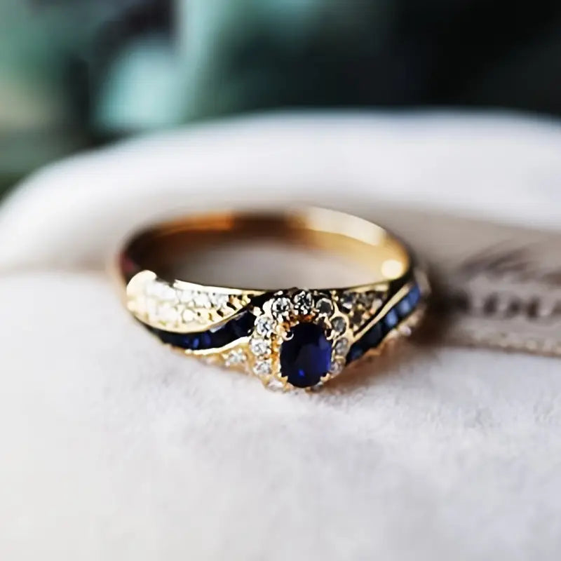 Oval Sapphire Halo Ring with Gold-Tone Filigree Band — view 2