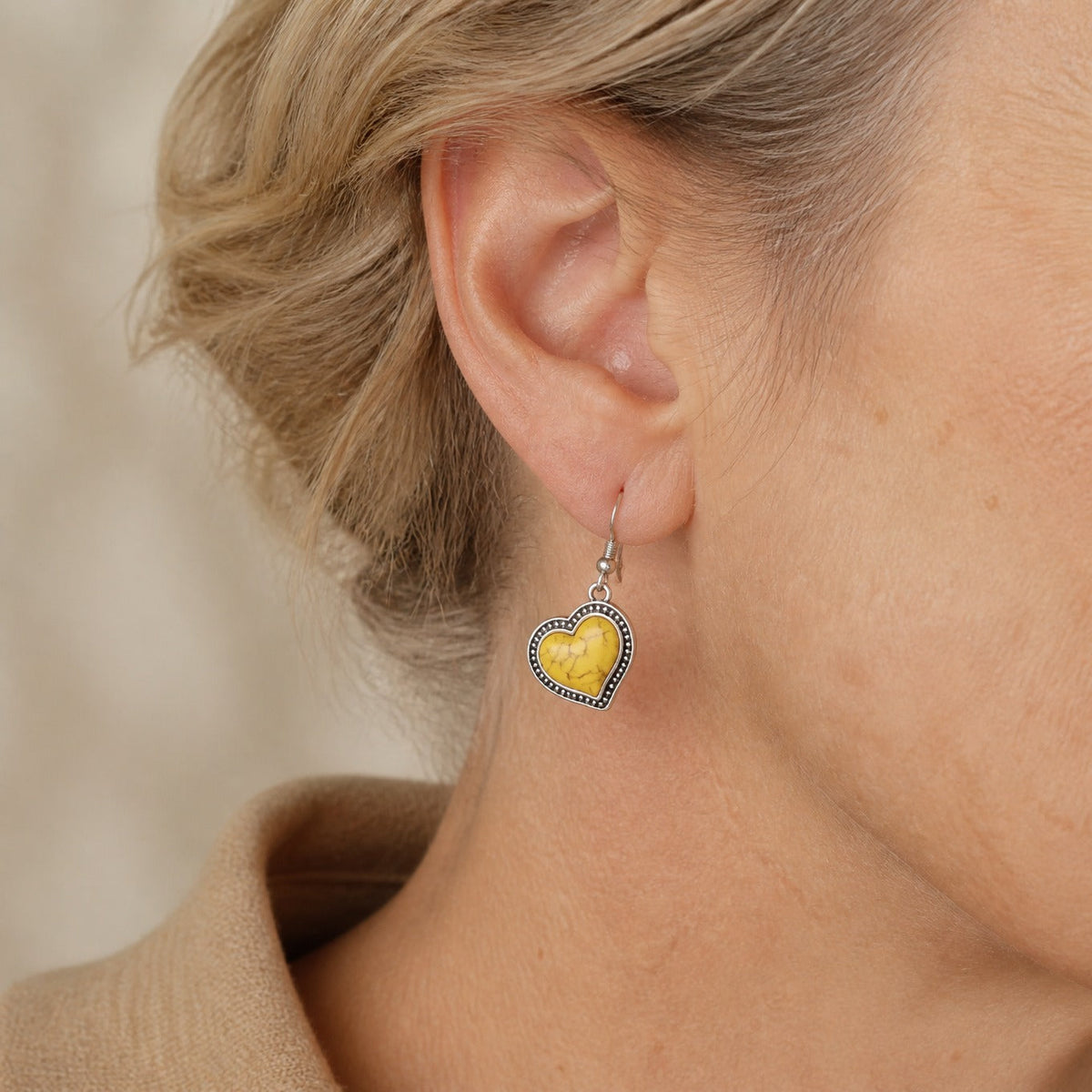 Heart-Shaped Yellow Resin Earrings with Beaded Silver-Tone Border — main image
