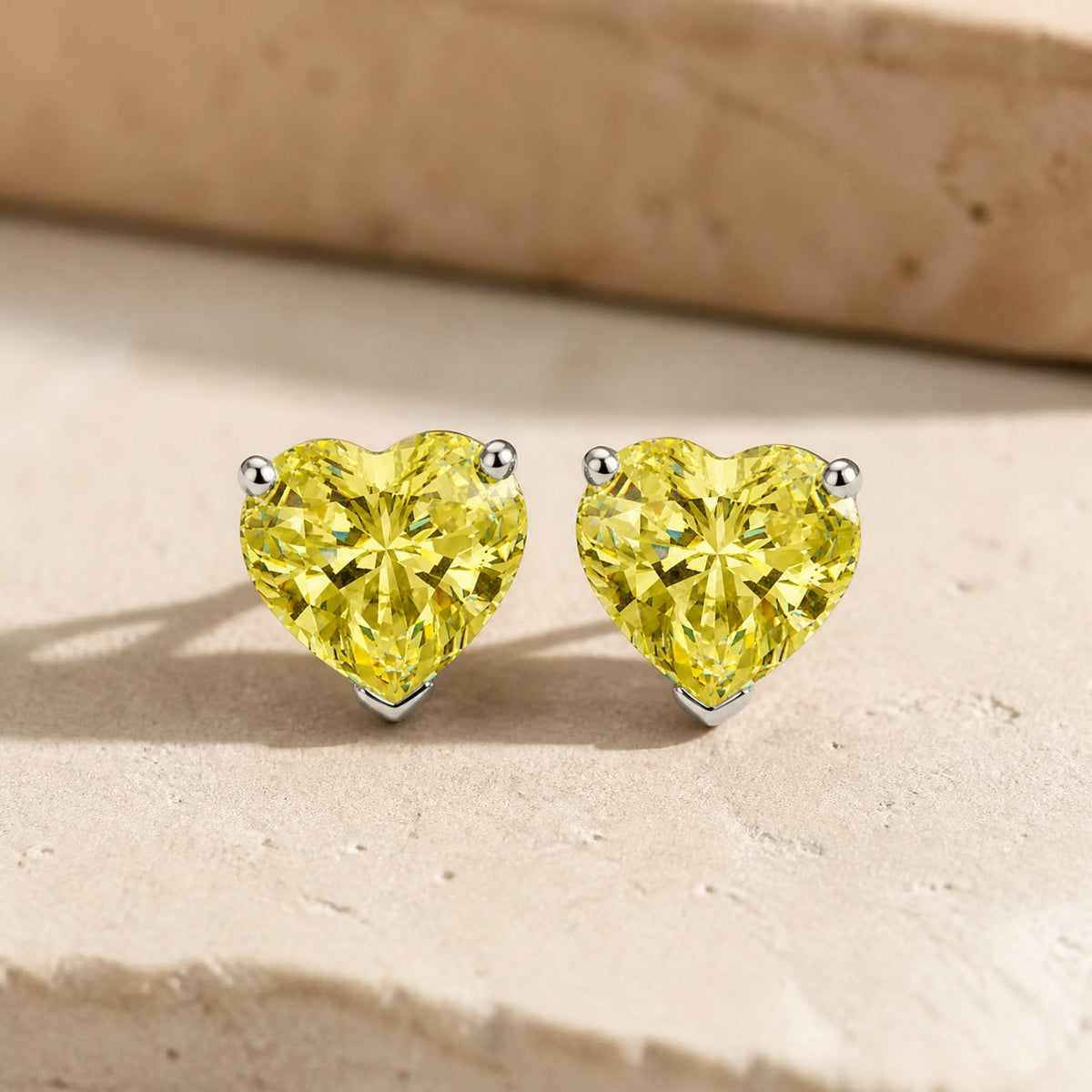 Heart-Shaped Yellow Cubic Zirconia Stud Earrings with White Gold-Tone Setting — main image