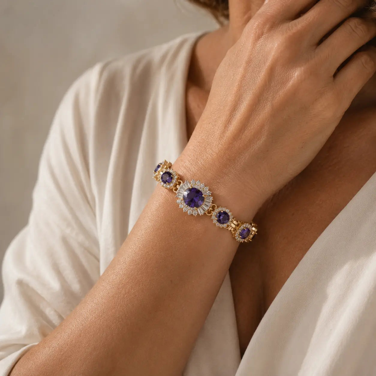 Amethyst Station Tennis Bracelet with Oval Center Stone and Halo Accents