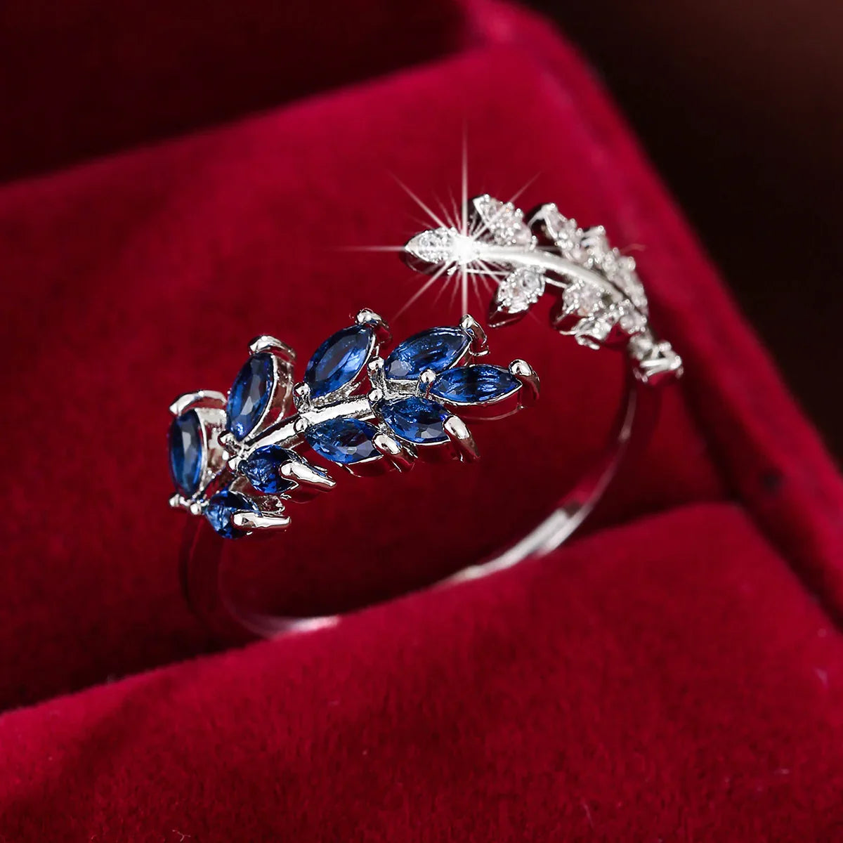 Leaf Motif Emerald and Sapphire Cluster Ring with Open Band