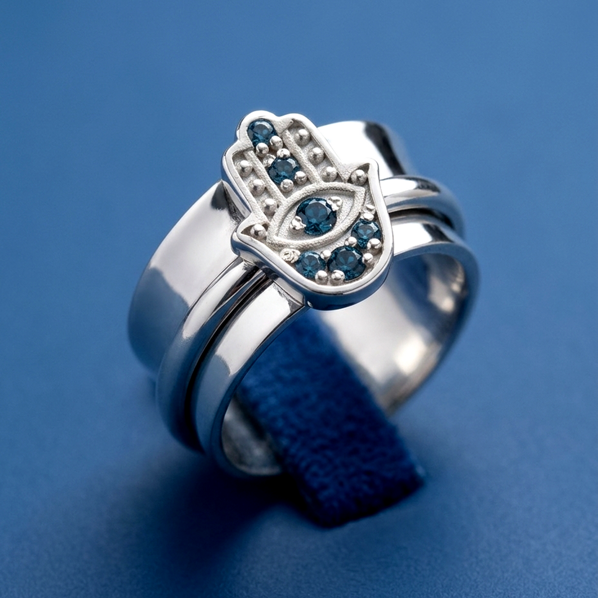 Hamsa Blue Topaz Fidget Ring with Spinning Band and Eye Detail