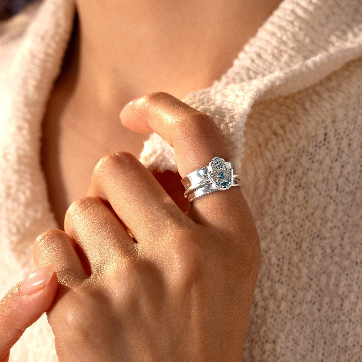 Hamsa Blue Topaz Fidget Ring with Spinning Band and Eye Detail