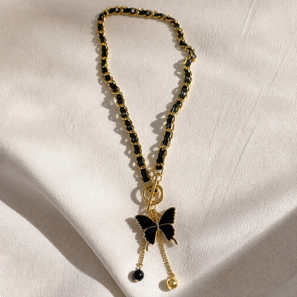 Butterfly Pendant Necklace with Black Tassel and Gold-Tone Chain — main image