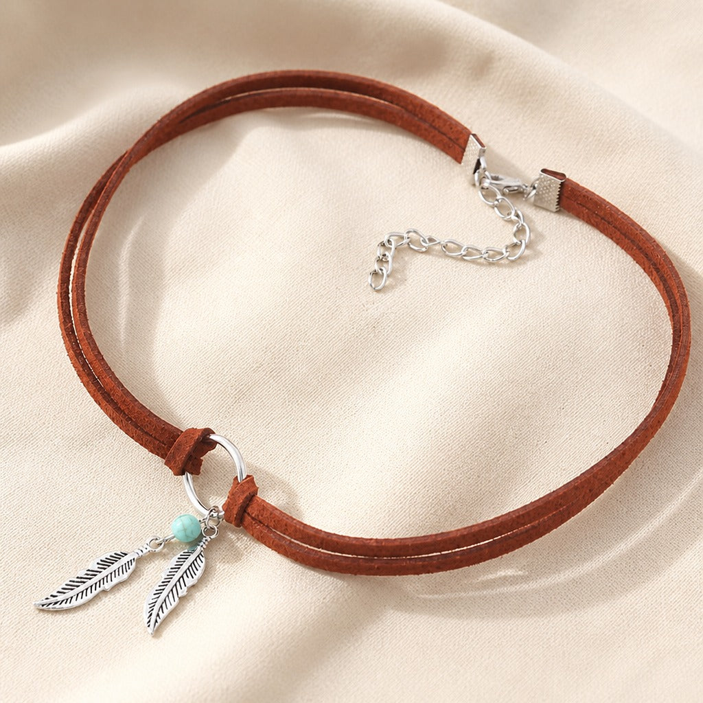 Feather Charm Choker Necklace with Turquoise Bead and Suede Cord — view 2