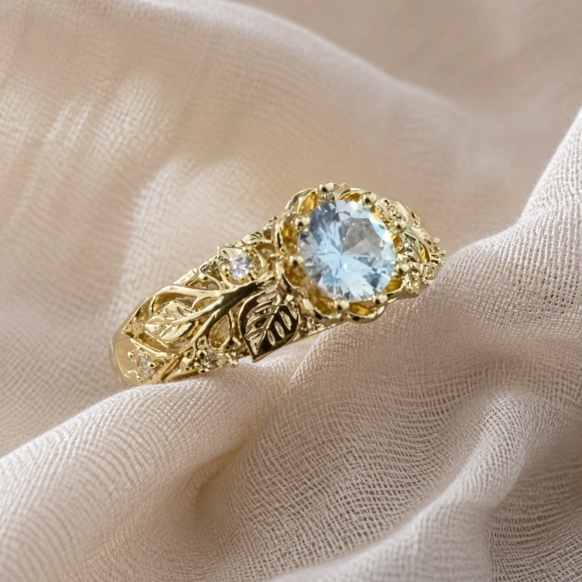 Light Blue Zirconia Ring with Gold-Tone Leaf Filigree Band — main image