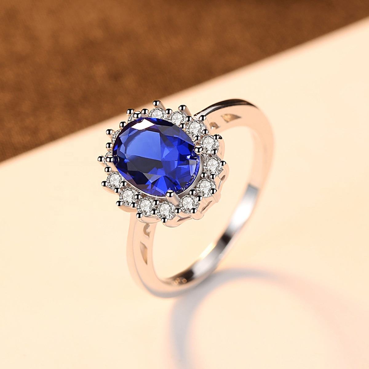 Oval Blue Sapphire Halo Ring with Two-Tone Band — view 3