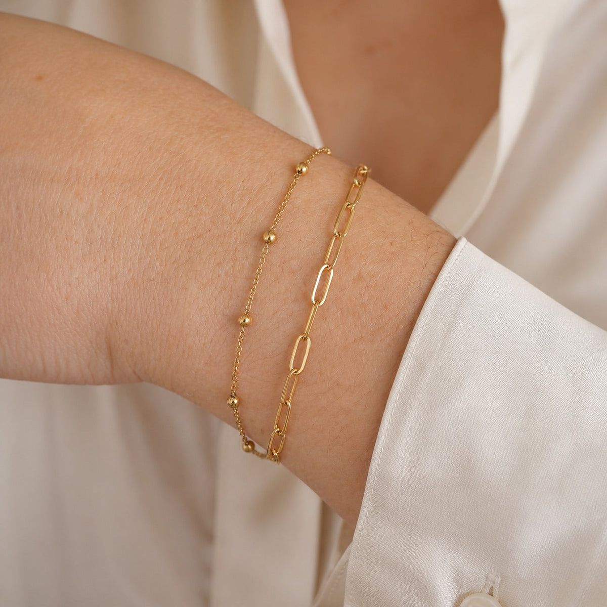 Double Layer Paperclip Chain Bracelet with Bead Accents in Gold Tone — main image