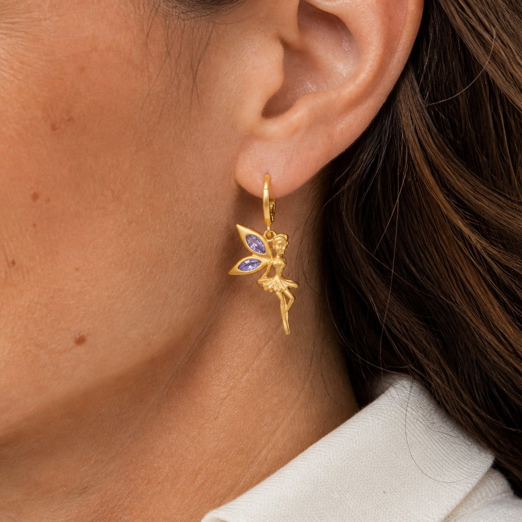 Fairy Charm Hoop Earrings with Purple Gemstone Wings in Gold Tone — main image